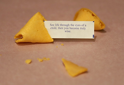 Open fortune cookie with message 