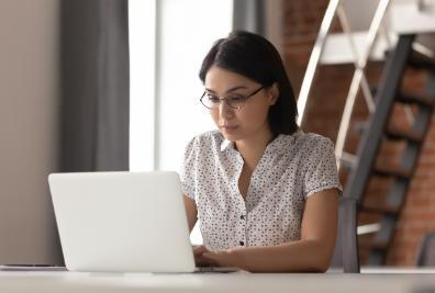 female professional using laptop